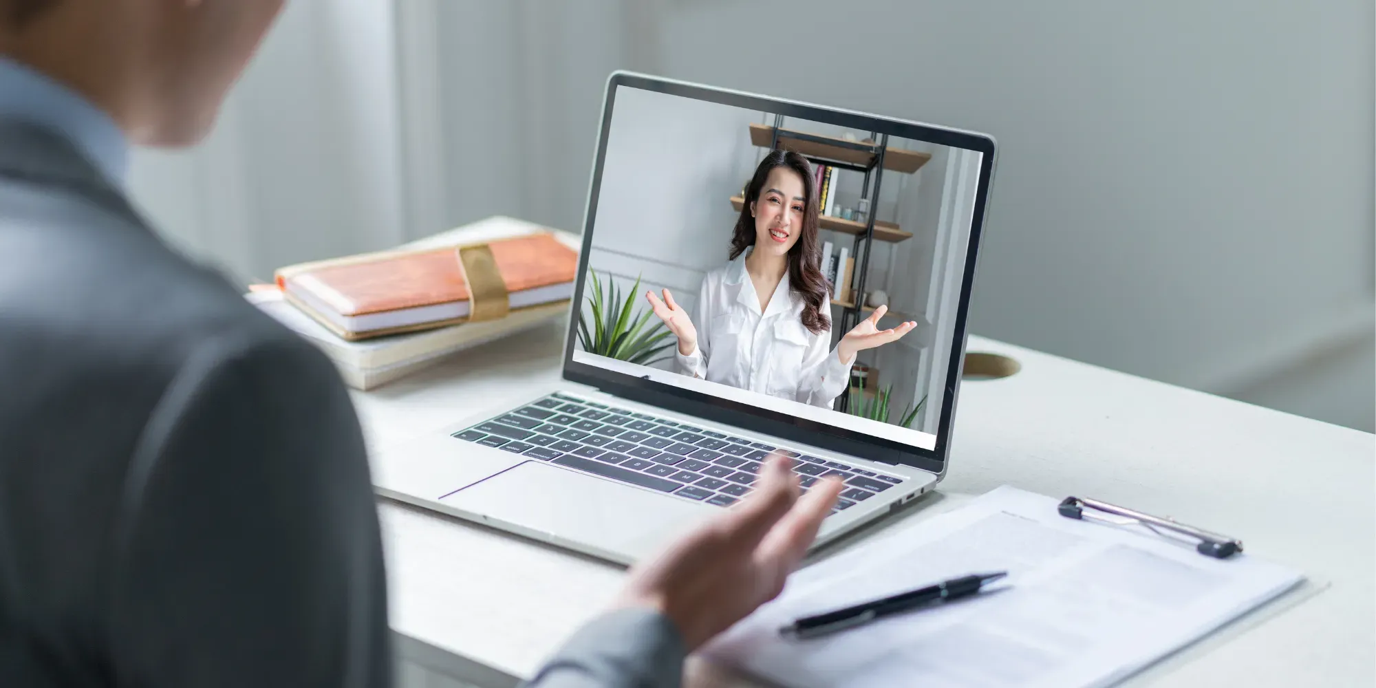 Woman and man walk and talk about insurance remotely