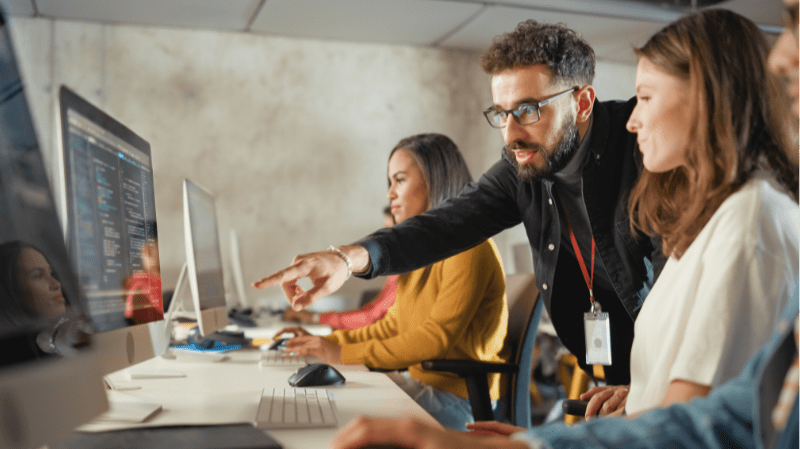 Group of employees working together on a project.