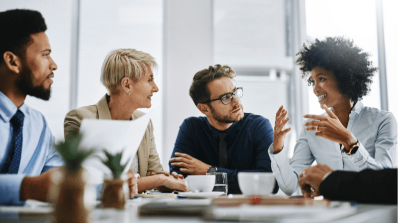 Group of professionals holding a strategy meeting.