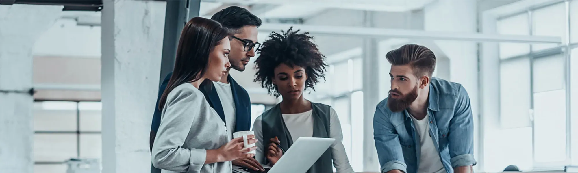Diverse employees and recruitment professionals at Pinnacle Staffing in Winnipeg, Manitoba. 